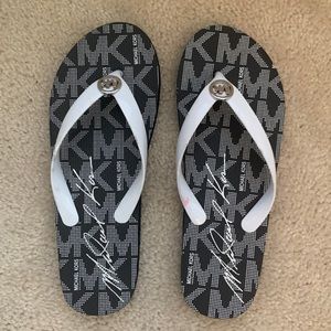 Michael Kors flip flops.